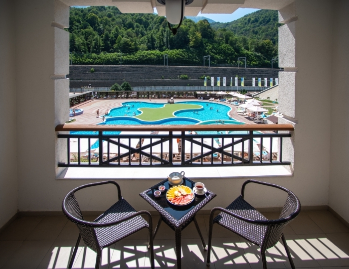 Делюкс с видом на горы с одной двуспальной кроватью - Отель Марриотт Красная Поляна / Sochi Marriott Krasnaya Polyana